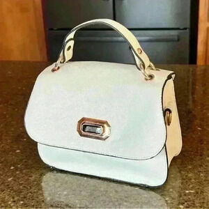 BOUTIQUE Style adorable small white purse / handbag with gold hardware and strap